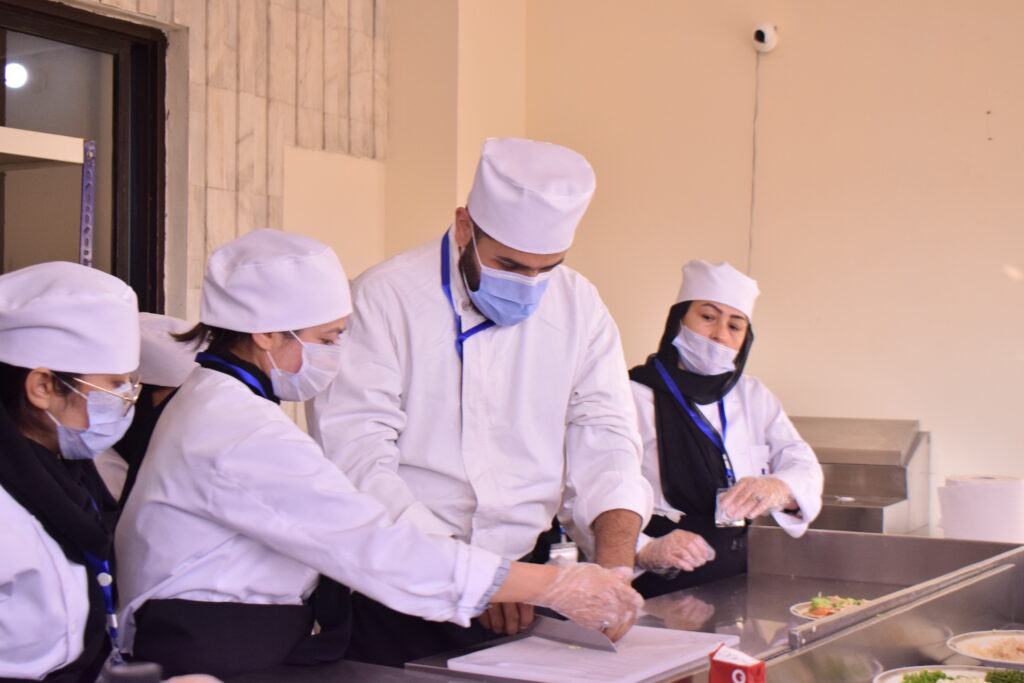 future chefs perfect their skills under expert guidance.